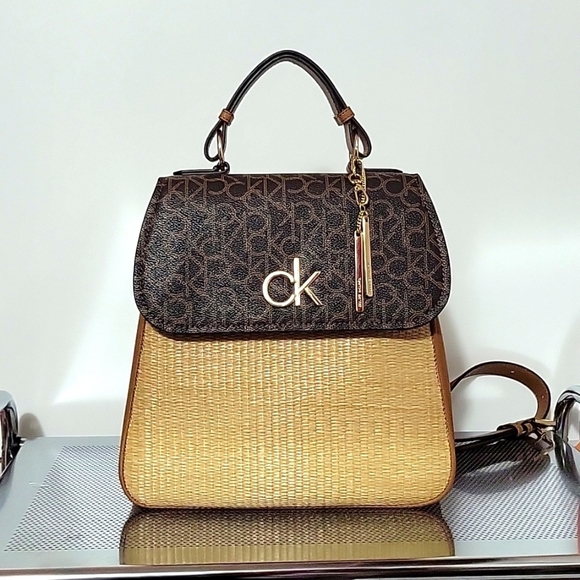 Straw Monogram Backpack. Beige/Brown/Black. Medium